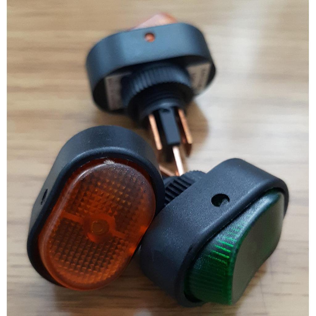 SWITCH OVALADO TECLA VERDE/AMBR HELLA ¢3.500